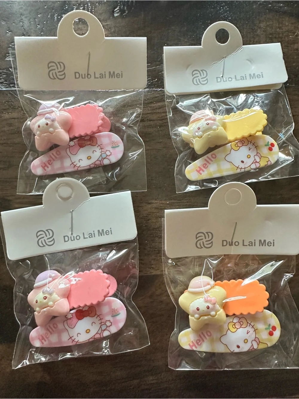 NWT Set of 4 Hello Kitty Child Size Hair Clips Barretts Pink Yellow Orange